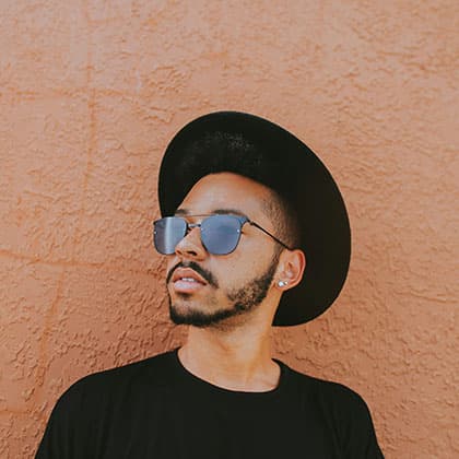 Mich, Chief Sunglasses Officer, expert stylist shaping top sunglasses trends.